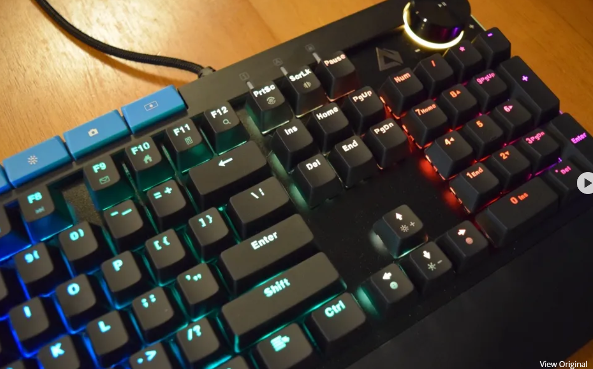 AUKEY KMG17 Mechanical Keyboard – Blue Switches (104‑Key) with Volume Control